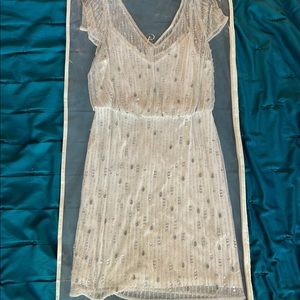 White beaded mid length dress